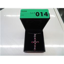 Genuine ruby set in a sterling silver cross