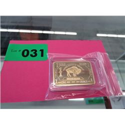 One ounce gold clad American buffalo bar