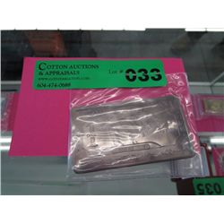 .999 titanium one ounce silver bar. U.S. mint