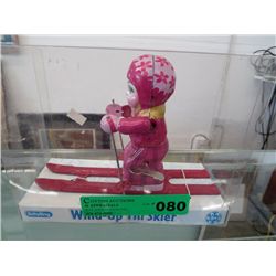 Wind-up tin skier by Schylling