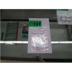 .999 solid silver carved art bar.