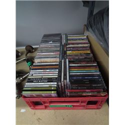 Approximately 7 dozen music CDs