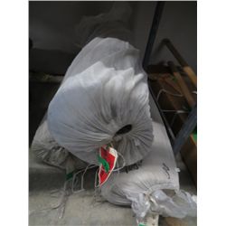Three rolls of fabric