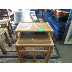 Two wicker and bamboo nesting tables