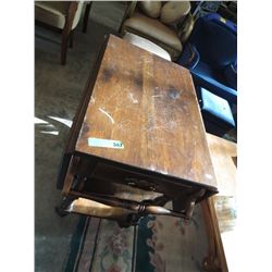 Rolling wooden tea trolley with drop leaf sides