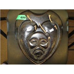 Carved native mask 12" x 10"