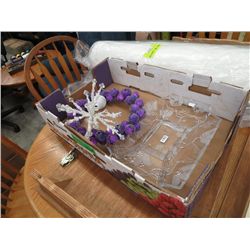 Box of Christmas decorations & an appetizer plate