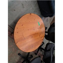 Round pedestal style coffee table
