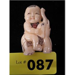Japanese carving 2.5" tall - flat back