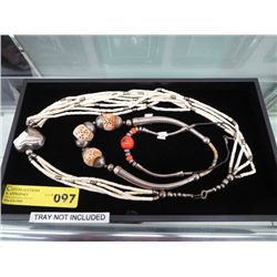 Three bead and bone necklaces