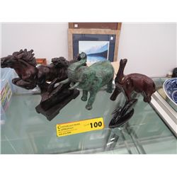 Four figurines, assorted materials