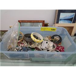 Plastic tote of costume jewelry