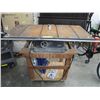 Image 1 : Table saw on a rolling stand