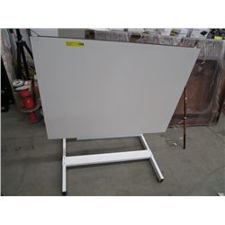 Adjustable drafting table