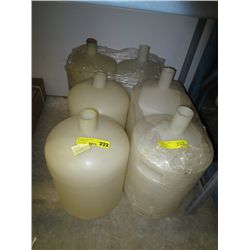 Six plastic carboys