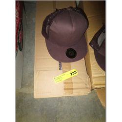 Case of brown mesh backed caps