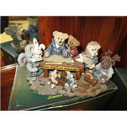 Two Boyd's bears and friends, with boxes
