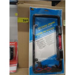 Box of License plate  frames with back up alarms