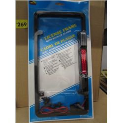 Box of License plate frames with back up alarms