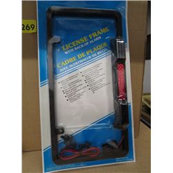 Box of License plate  frames with back up alarms