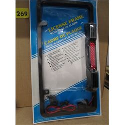 Box of License plate frames with back up alarms