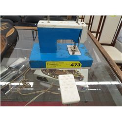 Vintage toy sewing machine