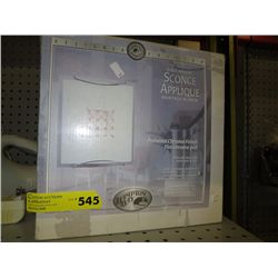 Wall sconce in box