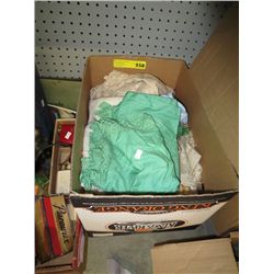 Box of vintage table linens and doilies