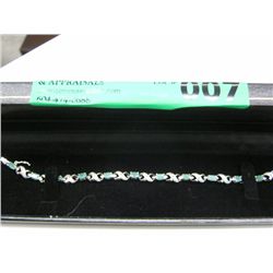 6.00 carat emerald & diamond tennis bracelet