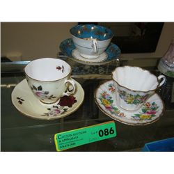 Three sets of English tea cups and saucers
