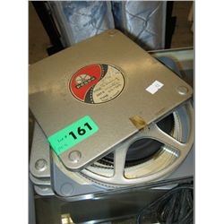 Four vintage film reel cannisters