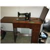 Image 1 : Vintage Singer sewing machine in cabinet
