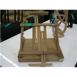 Portable paint box with attached easel