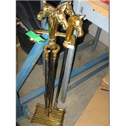 Brass fireplace tools with horsehead motif