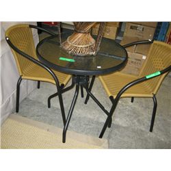 Small glass top patio table and chairs