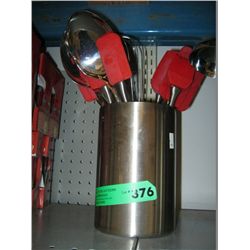 Stainless steel container with kitchen utensils