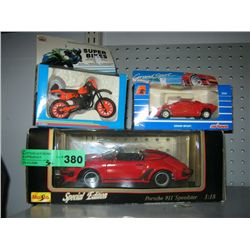 Three model cars and motorcycles