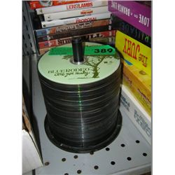 Disk stand containing approx. 5 doz. CDs and DVDs