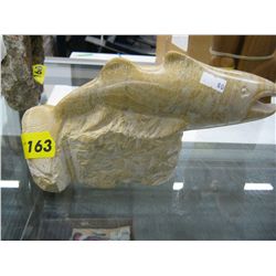 Carved stone fish statue