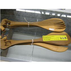Two sets of carved wood salad spoons