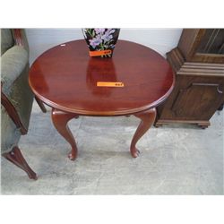 Small wood accent table (slightly oval)
