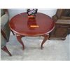Image 1 : Small wood accent table (slightly oval)