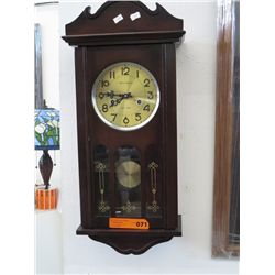 Pendulum wall clock - key wind 26" tall 11" dia.