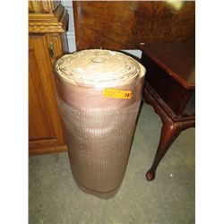 Roll of clear carpet protector runner