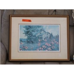 Framed print of a cottage