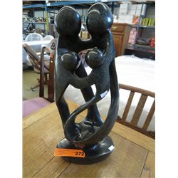 Carved stone statue of a family 18" tall
