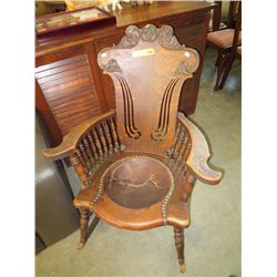 Antique carved back rocking chair