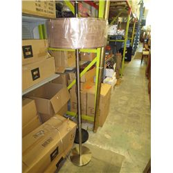 Floor lamp with brown drum shade