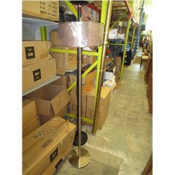Floor lamp with brown drum shade