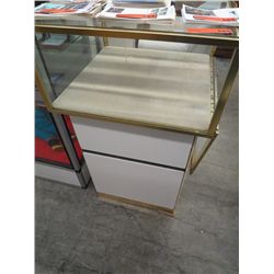 Glass retail display case on pedestal